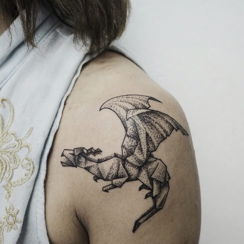 Различные стили татуировок драконов